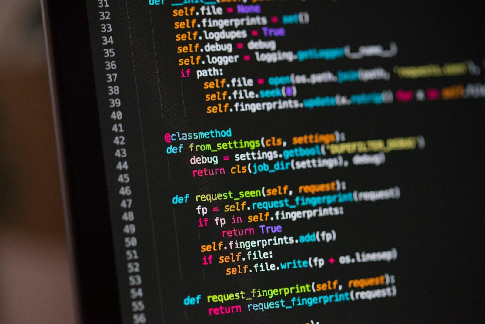 Close-up of source code on a monitor